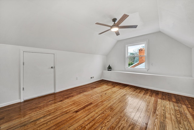 bonus room with ceiling fan, lofted ceiling, and wood-type flooring