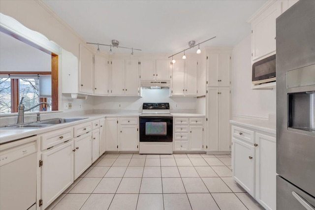 kitchen with range with electric stovetop, dishwasher, sink, and white cabinetry