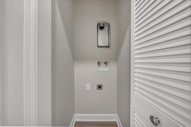 laundry room with wood-type flooring, hookup for an electric dryer, and washer hookup