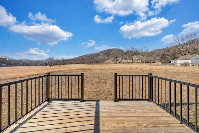 wooden terrace with a rural view