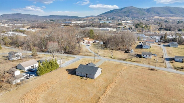 drone / aerial view featuring a mountain view