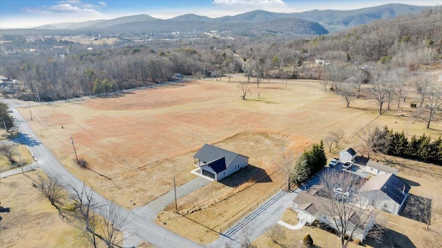 aerial view featuring a mountain view and a rural view