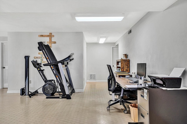 home office featuring visible vents and baseboards