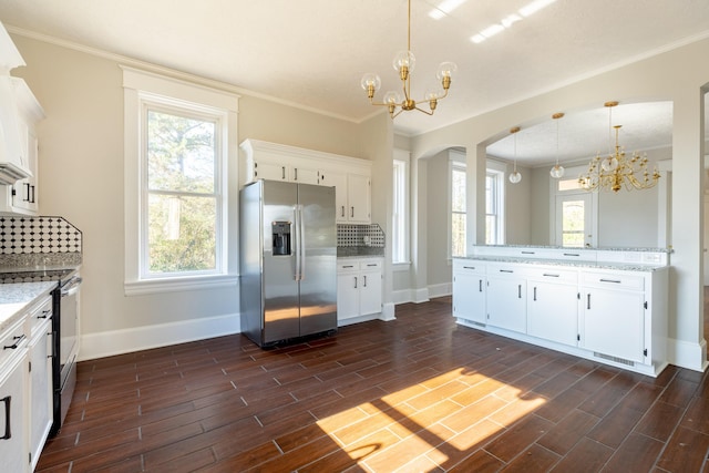 kitchen with stainless steel appliances and white cabinets