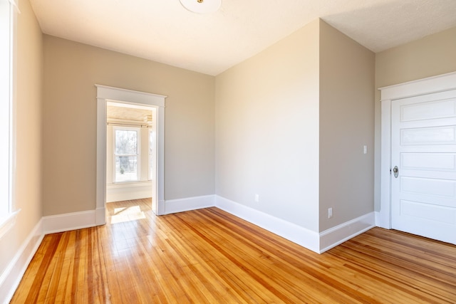 empty room with light wood-type flooring