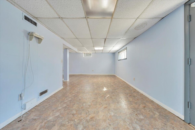 basement with a drop ceiling