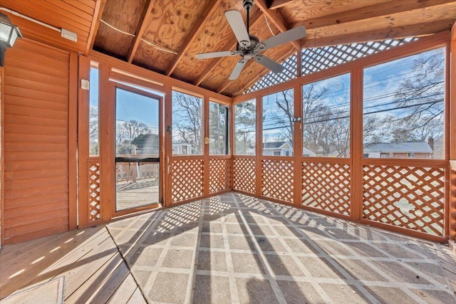 unfurnished sunroom featuring lofted ceiling, wooden ceiling, and ceiling fan