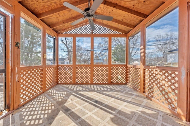 unfurnished sunroom with lofted ceiling and ceiling fan