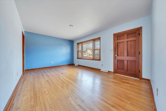 empty room featuring light hardwood / wood-style flooring