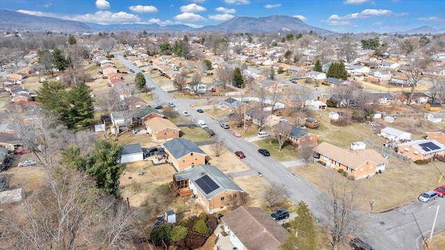 birds eye view of property featuring a mountain view