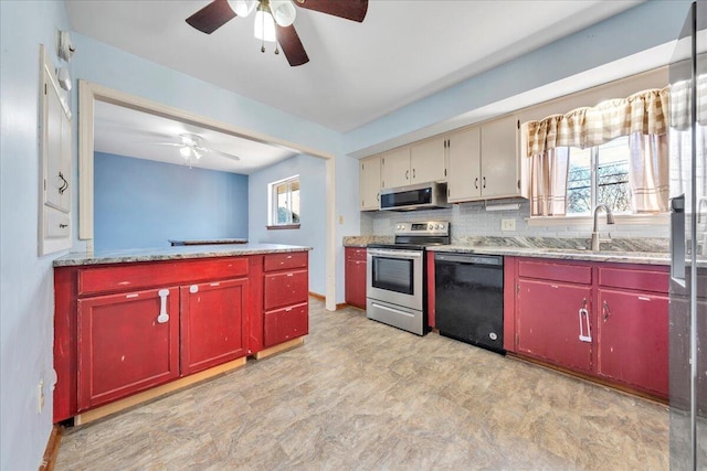 kitchen featuring backsplash, sink, ceiling fan, and appliances with stainless steel finishes