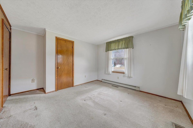 unfurnished bedroom with a baseboard radiator, ornamental molding, light colored carpet, and a textured ceiling