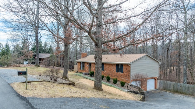 single story home with a garage