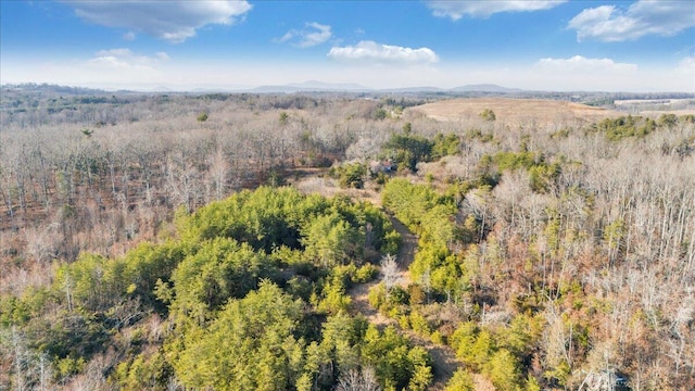 drone / aerial view with a view of trees