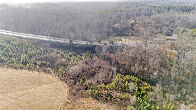 bird's eye view featuring a view of trees