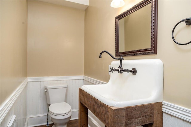 bathroom with sink and toilet