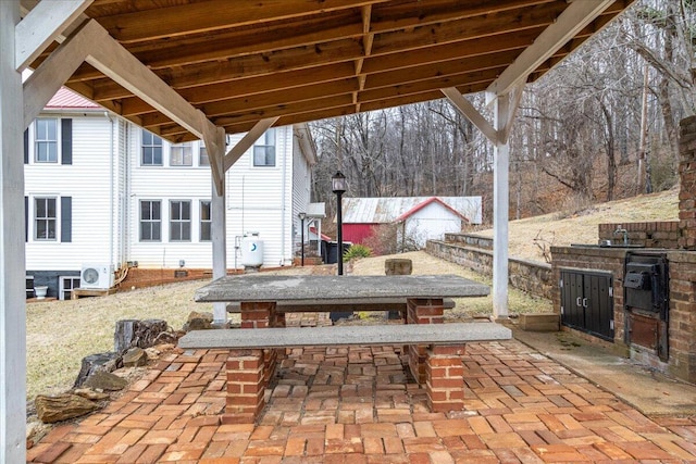 view of patio featuring ac unit