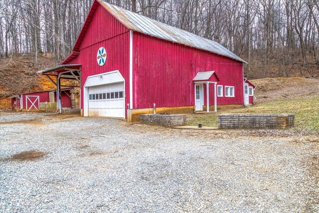 view of outbuilding featuring a garage