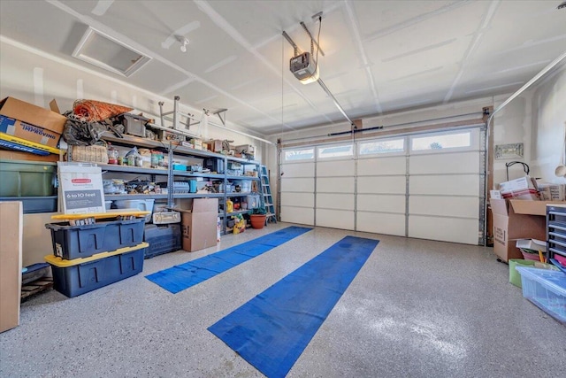 garage featuring a garage door opener