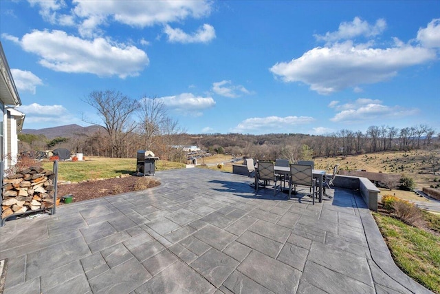 view of patio featuring a mountain view