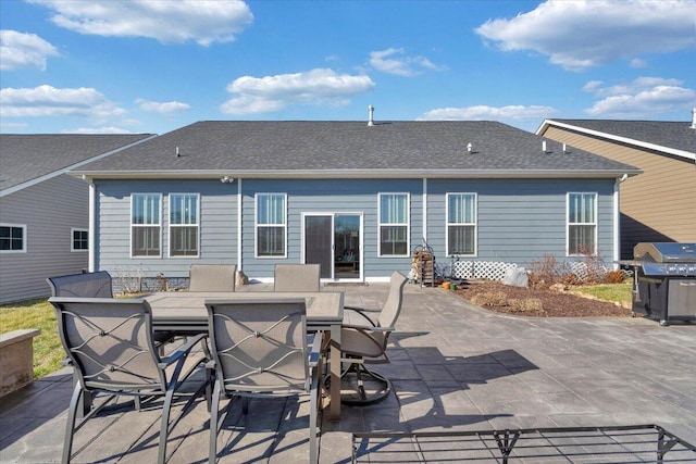 rear view of property with a patio