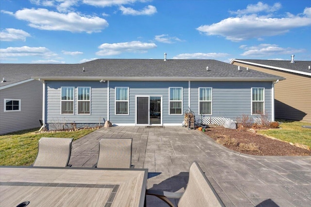 back of house with a patio area