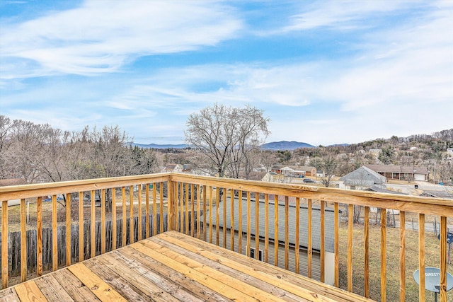 wooden terrace featuring a mountain view