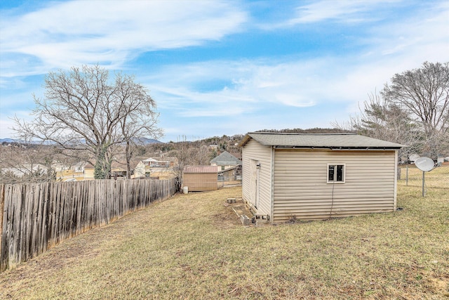 exterior space with a shed