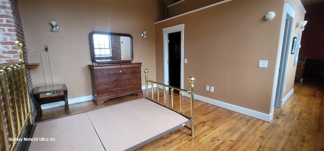 bedroom featuring wood-type flooring