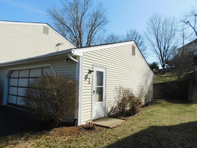 view of home's exterior with a garage