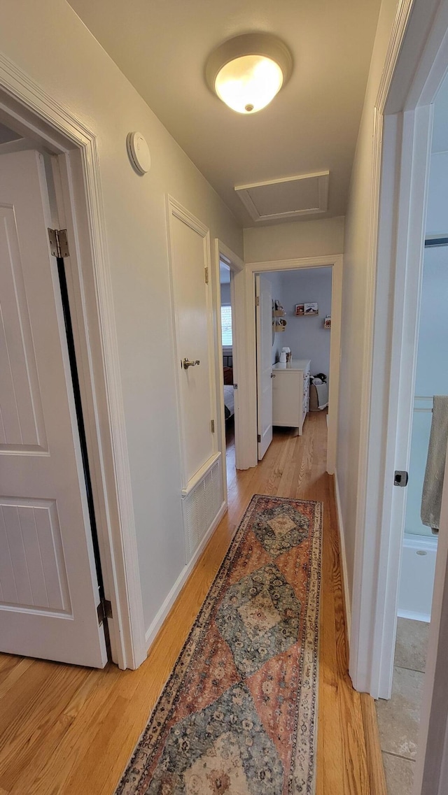 hallway featuring light hardwood / wood-style floors