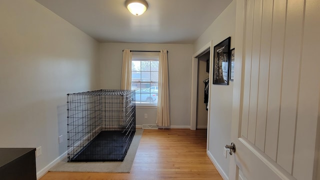 unfurnished bedroom with light wood-type flooring