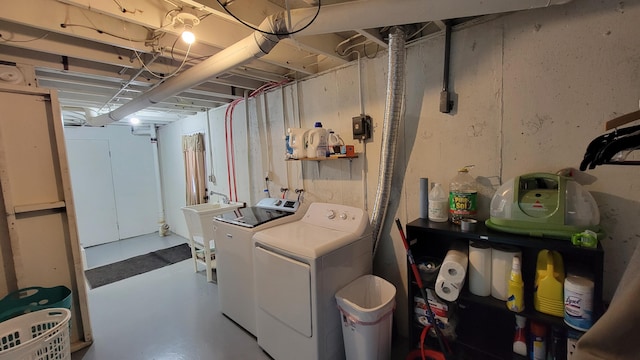 washroom featuring washing machine and dryer and sink