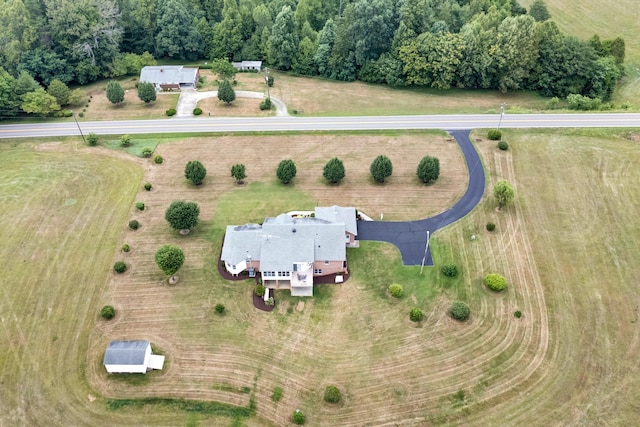 birds eye view of property featuring a rural view