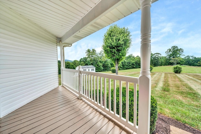 deck featuring a yard