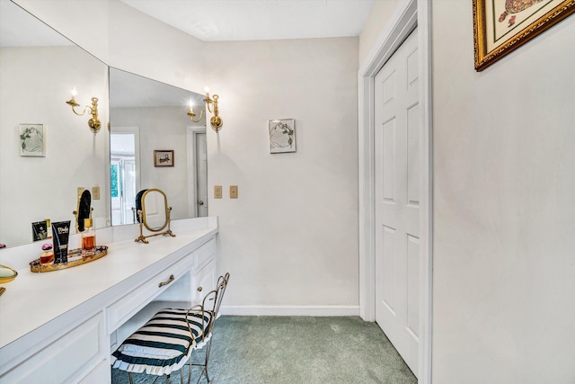 bathroom featuring baseboards and vanity