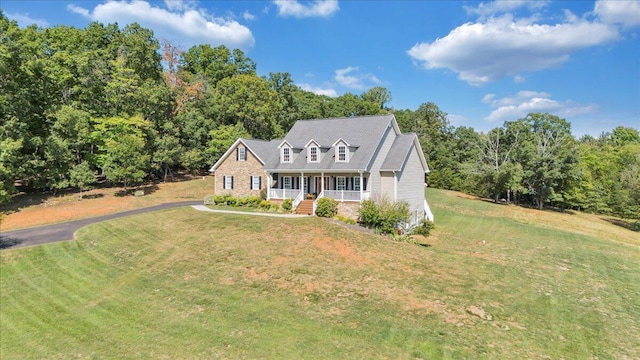 view of front of home with a front lawn and covered porch