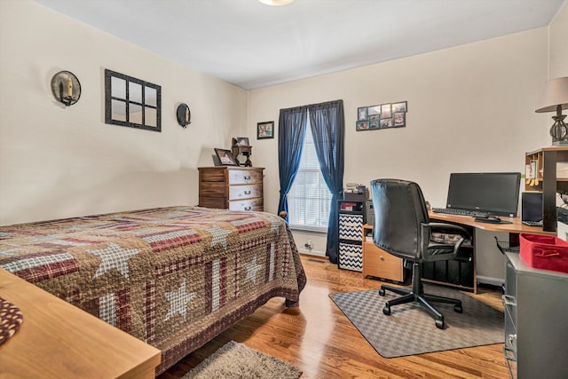 bedroom featuring light hardwood / wood-style floors