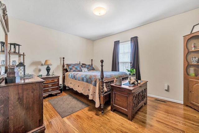 bedroom featuring light wood-type flooring