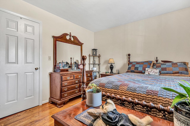 bedroom with wood-type flooring