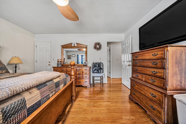 bedroom featuring ceiling fan and light hardwood / wood-style flooring