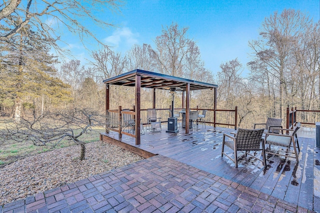 wooden terrace with a gazebo