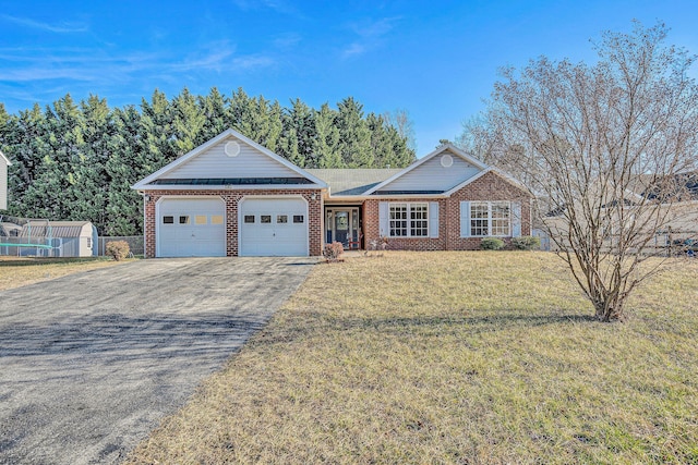 ranch-style home with a garage and a front yard