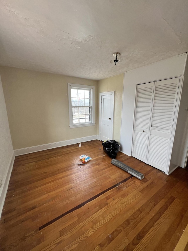 exercise area with hardwood / wood-style flooring