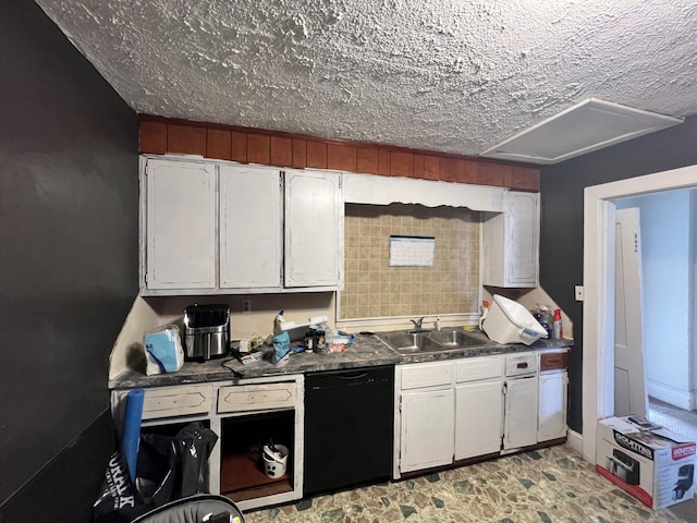 kitchen featuring white cabinetry, black dishwasher, sink, and a textured ceiling