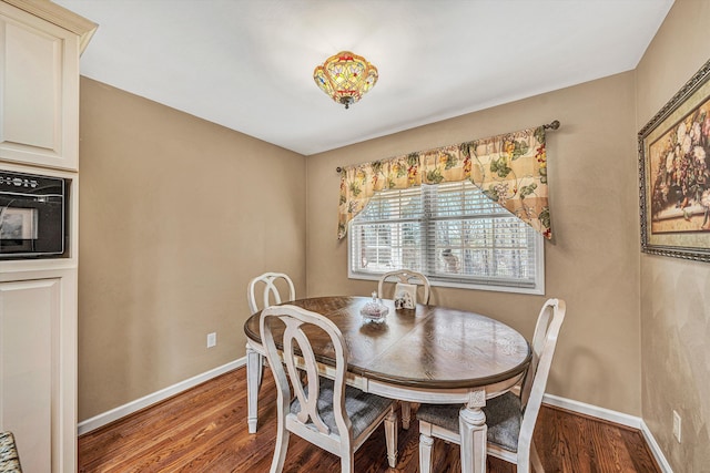 dining room featuring wood-type flooring