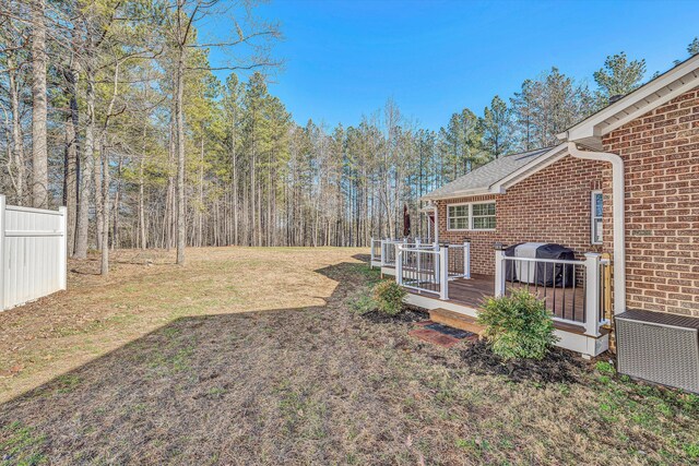 view of yard with a deck