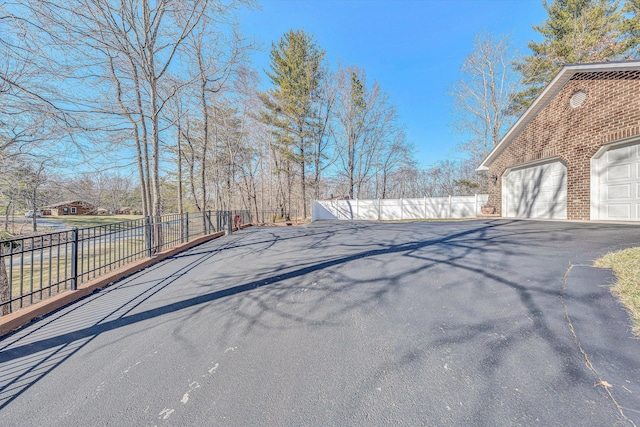 view of yard featuring a garage