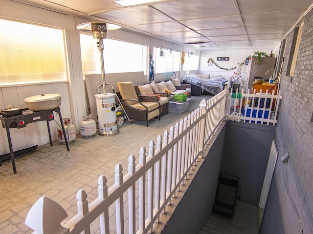 view of patio / terrace with an outdoor living space and a balcony