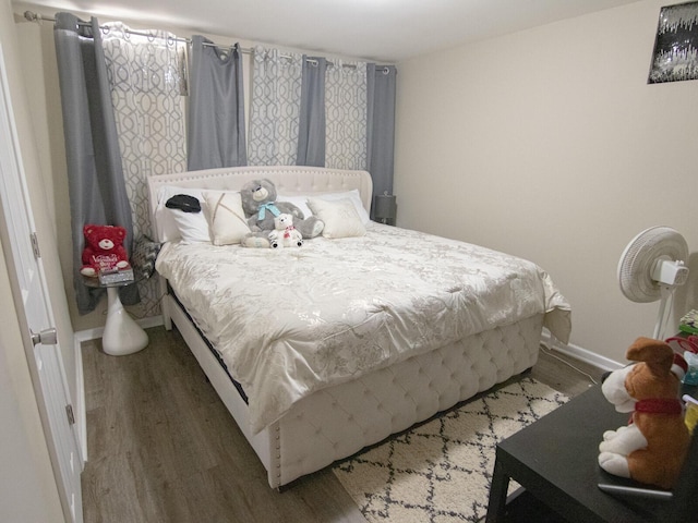 bedroom featuring dark hardwood / wood-style floors